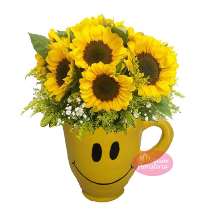 Girasoles en taza